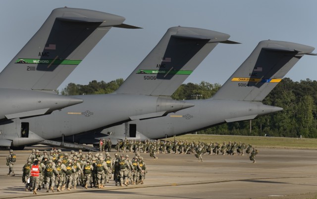82nd Airborne Div. Soldiers load for jump