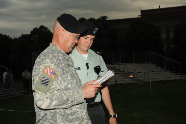 Soldiers rehearse for start of Twilight Tattoo on May 5