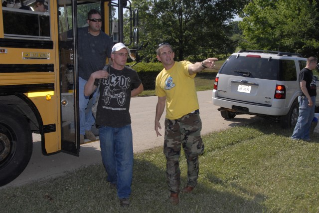 Soldiers with 101st Airborne Division help clean up flood areas