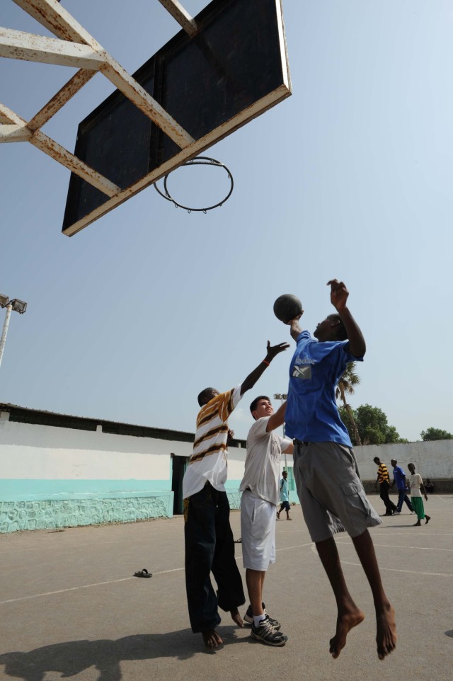 Military volunteers improve community for Djibouti youth