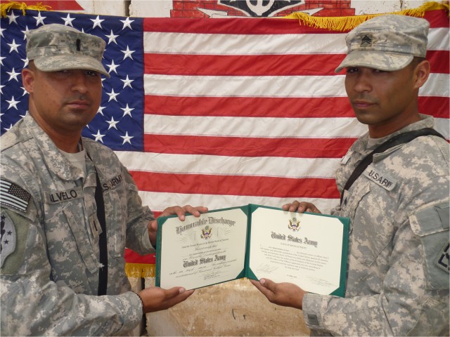 7th Engineer Battalion Soldier receives re-enlistment oath from older brother