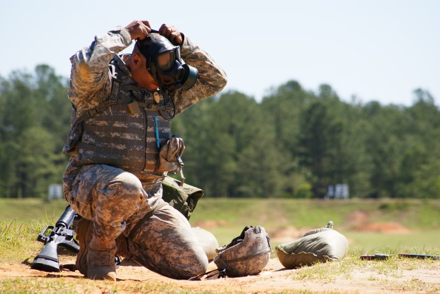 Soldier Dons Gas Mask