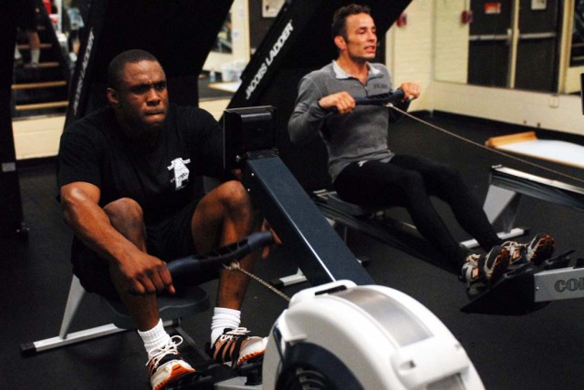 WCAP wrestlers James Johnson and Glenn Garrison exercise on row machines May 4 at the Audie Murphy Athletic Performance Enhancement Center.  The team stopped at Fort Benning from May 4-10 to train for the 2010 World Team Trials, which will be June...