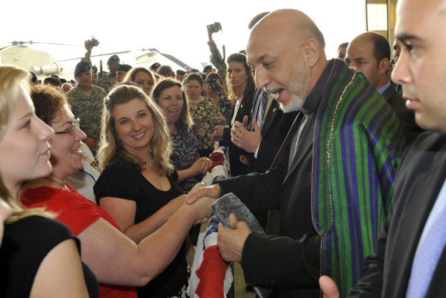 Karzai greets Family members