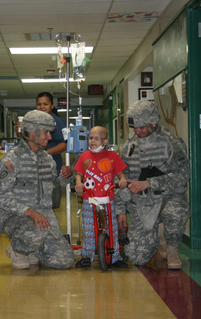 Making them smile:  Soldiers bring cheer to sick children