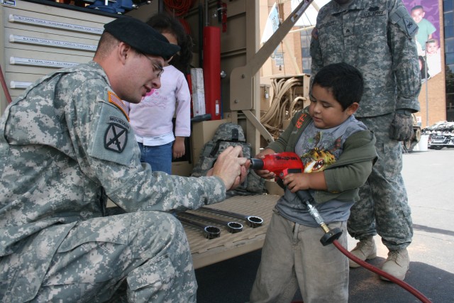 Making them smile:  Soldiers bring cheer to sick children