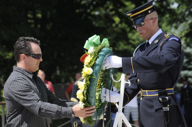 Oakley representatives lay wreath at Arlington