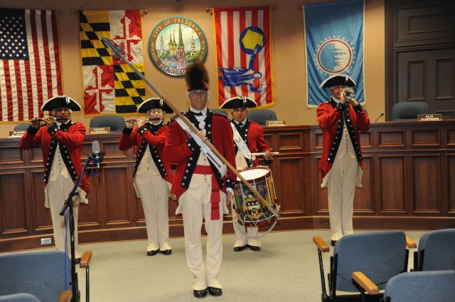 Soldiers participate in Ft. Detrick Twilight Tattoo Press Conference on May 25, 2010 