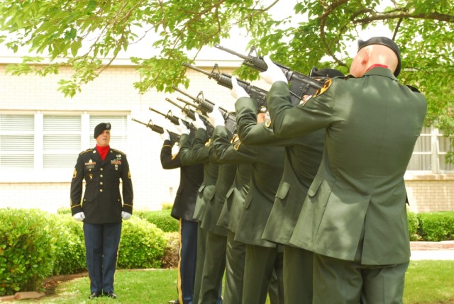 FORT HOOD, Texas-Soldiers from 3rd Battalion, 82nd Field Artillery Regiment, 2nd Brigade Combat Team, 1st Cavalry Division, prepare to fire a 21-gun salute in honor of Pfc. Mark West during West's memorial ceremony, May 18. West died May 8 from...