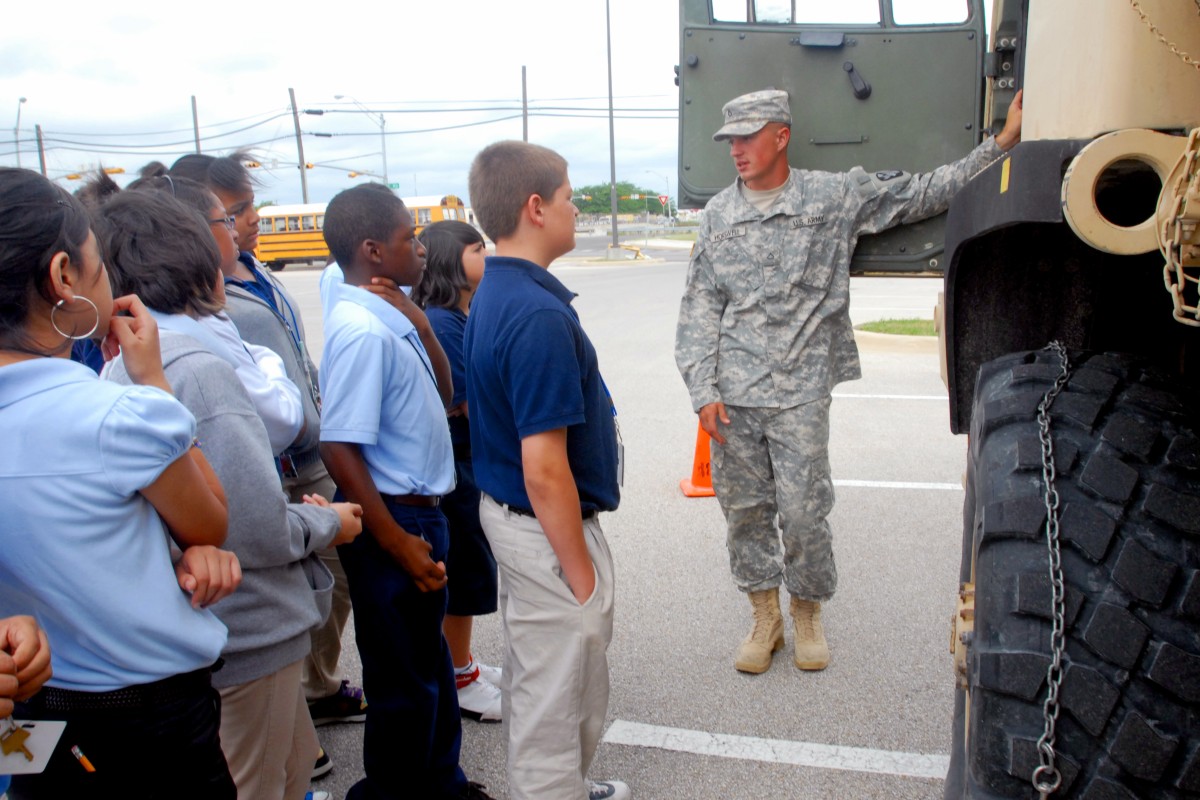 Soldiers Use Trucks to Teach Math and History to Kids