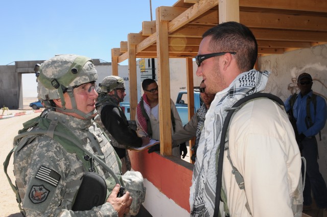 Col. Vaughn practices interviewing Iraqi role-players