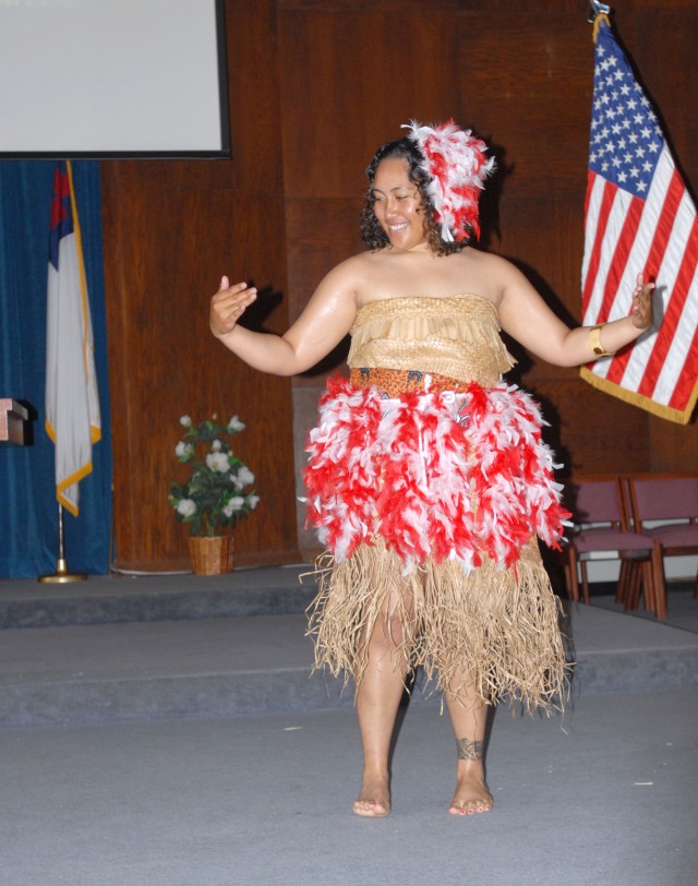 FORT HOOD, Texas-Spc. Siupolufaataualofa Maika, a native of Aua, American Samoa, and supply specialist with the 589th Brigade Support Battalion, dances the traditional Samoan "Taualuga" dance during the Asian/Pacific Heritage Celebration hosted by...