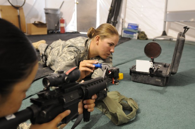 Armorer helps Soldier zero MILES gear