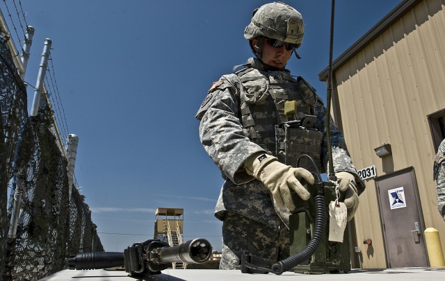 FORT HOOD, Texas-Wharton, Texas native, Sgt. Timothy Long, a shop foreman with the 2nd battalion, 20th Field Artillery Regiment, 41st Fires Brigade, assembles a field radio to perform a communication check during the 1st Cavalry Division Non...