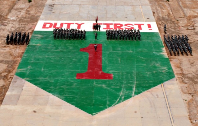1ID Soldiers re-enlist