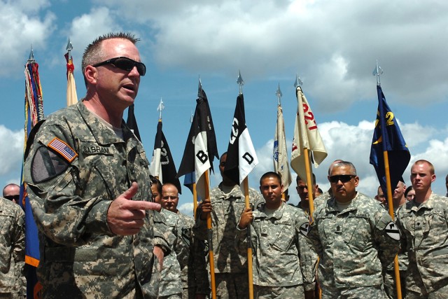 FORT HOOD, Texas-Soldiers from the 1st Air Cavalry Brigade listen as Col. Douglas Gabram, from Cleveland, Ohio, commander, 1st ACB, 1st Cavalry Division, thanked the 1st troopers for their support during his time as the brigade commander and for hono...