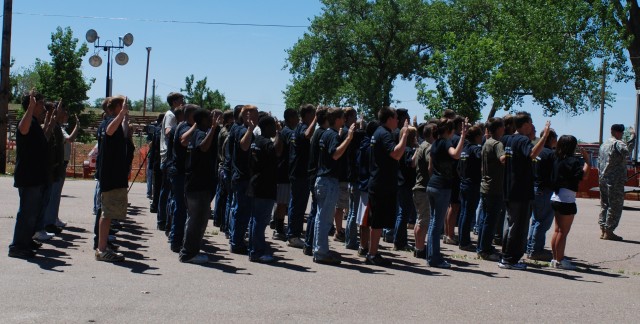 Recruits take oath of enlistment at Fort Carson
