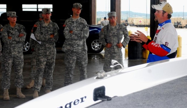 FORT HOOD, Texas- Eric Wendeborn (right), from Temple, Texas, explains proper boat handling and safety procedures to a group of Soldiers from 2nd Special Troops Battalion, 2nd Brigade Combat Team, 1st Cavalry Division, during a safety day on Fort Hoo...