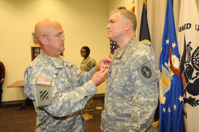 Col. Mark Rivest receives Meritorious Service Medal