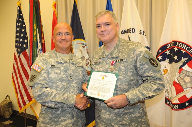 Col. Mark Rivest receives Meritorious Service Medal