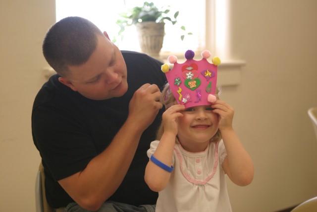 Dads, daughters bond at tea party