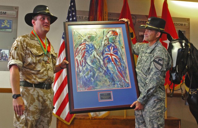 FORT HOOD, Texas - Lt. Col. Peter Little (left), native to Fleet, Hampshire, United Kingdom and former chief of operations, 1st Cavalry Division, presents Maj. Gen. Daniel Allyn, 1st Cav. Div. commander, with a painting that represents British and...