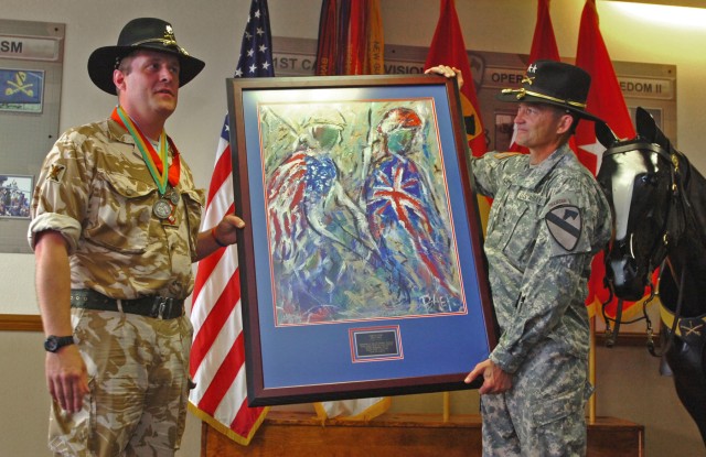 FORT HOOD, Texas - Lt. Col. Peter Little (left), native to Fleet, Hampshire, United Kingdom and former chief of operations, 1st Cavalry Division, presents Maj. Gen. Daniel Allyn, 1st Cav. Div. commander, with a painting that represents British and Am...