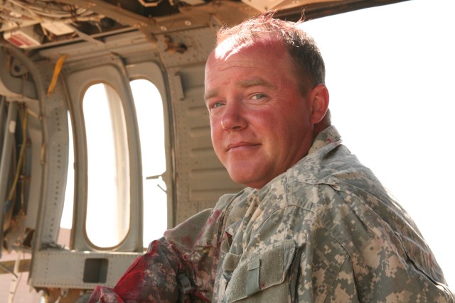 Sgt. Michael Perlitz joined the Army following the Sept. 11 terrorist attacks in 2001. Here he waits for his next portrayal of a helicopter victim during the 2010 U.S. Army Space and Missile Defense Command/Army Forces Strategic Command NCO/Soldier o...