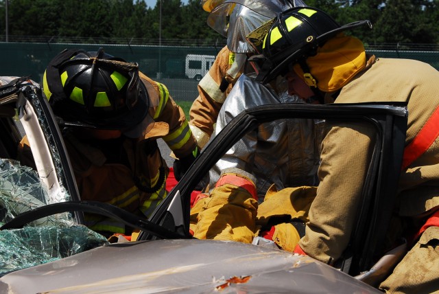 FORT A. P. HILL, Va.— Joint Task Force National Scout Jamboree emergency response personnel take part in an exercise and  skillfully remove a simulated injured person from a vehicle. The exercise is preparing the JTF to support the 2010 National Scou...