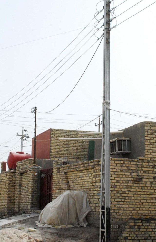 Iraqi citizens turn on the lights