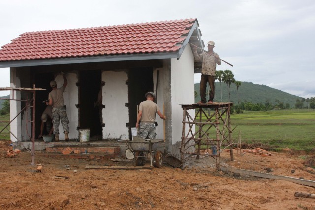 Utah and Cambodian Soldiers guard children&#039;s safety 