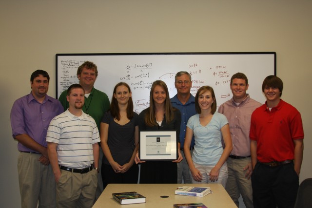 SMART students show off the award for ...
