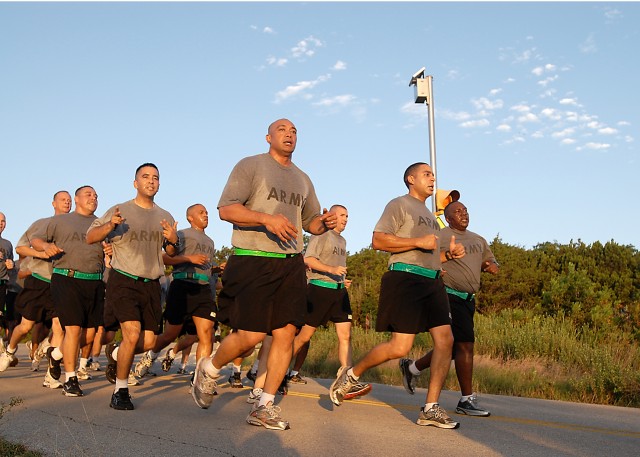 FORT HOOD, Texas - The first sergeants and command sergeants major of the 1st Air Cavalry Brigade, 1st Cavalry Division catch their breath running down hill during a Diamond Club run, here, July 30. The Diamond Club, which volunteers for charities an...
