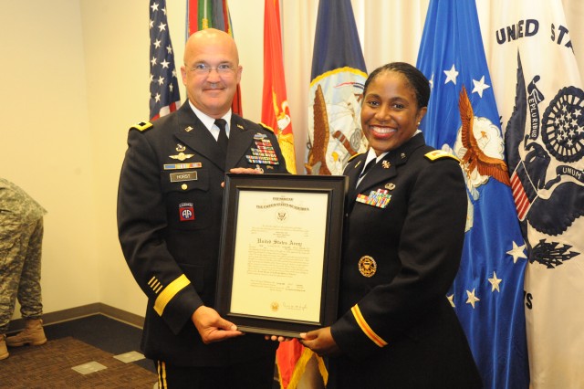 CG  JFHQ-NCR/MDW promotes Lt. Col. Donna Scott to Colonel on July 30