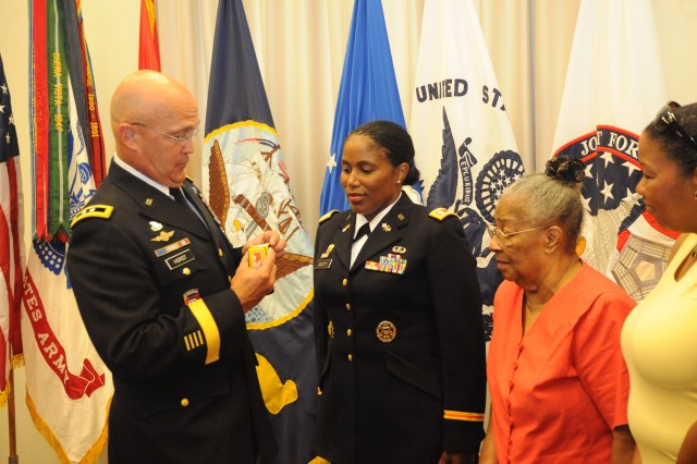 CG  JFHQ-NCR/MDW promotes Lt. Col. Donna Scott to Colonel on July 30 