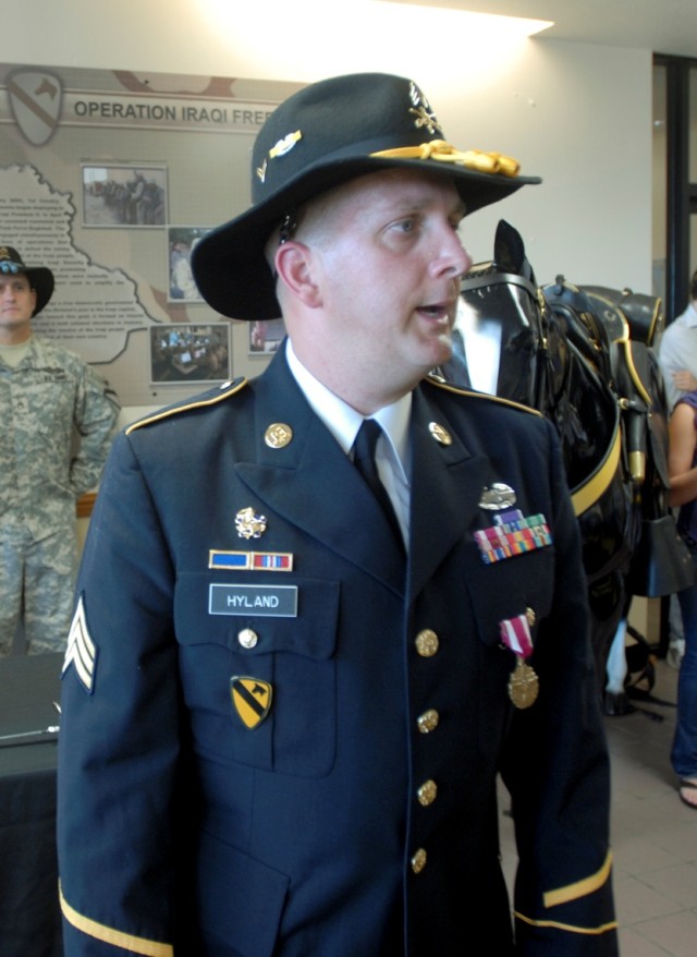 FORT HOOD, Texas - Sgt. John Hyland, a former 6th Squadron, 9th Cavalry Regiment, 3rd Brigade Combat Team, 1st Cavalry Division Soldier, who was injured in Iraq by a roadside bomb in 2007, presents a speech at a reception following the ceremony marki...