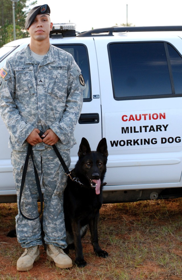 Fort Rucker dog handler, partner return home