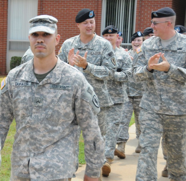 Fort Rucker dog handler, partner return home