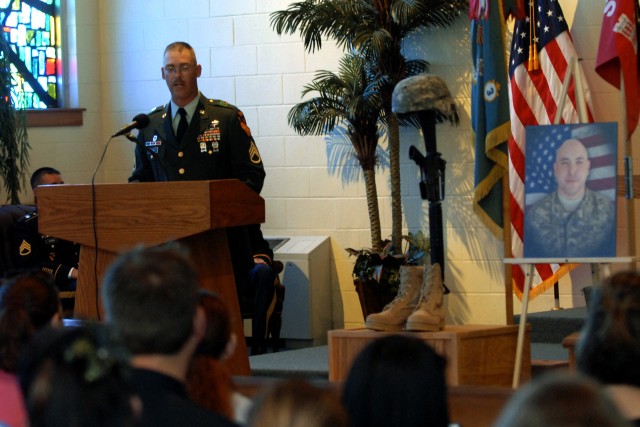 FORT HOOD, Texas - Staff Sgt. Douglas Garn, from Manton, Mi., assigned to C Company, 3rd Brigade Combat Team Special Troops Battalion, 1st Cavalry Division, addresses Soldiers and friends during a memorial service for Staff Sgt. Bradley Penman at...