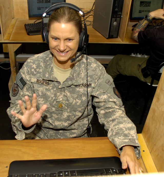 Deployed major attends 25th high school reunion via Skype