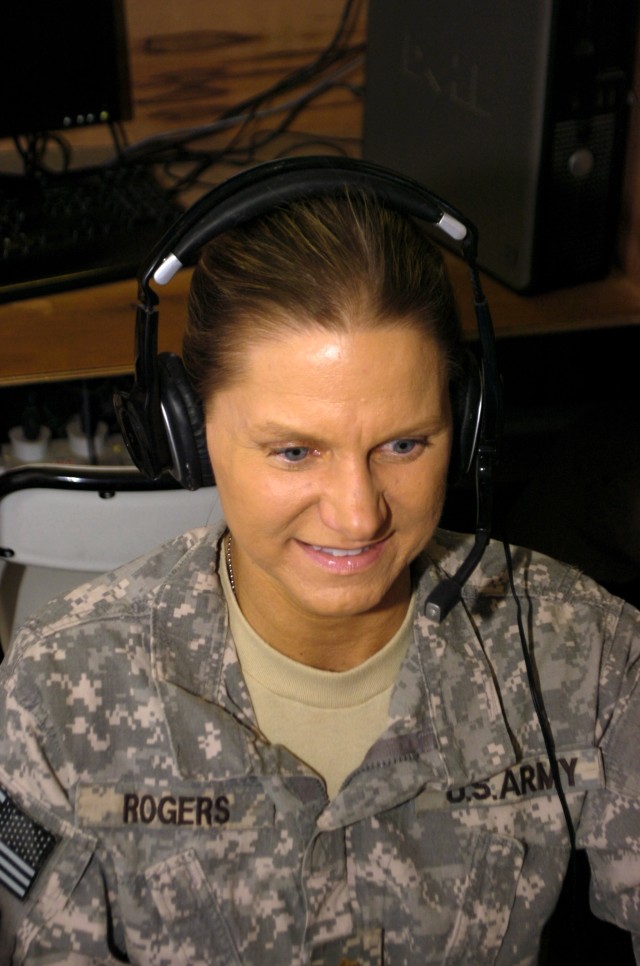 Deployed major attends 25th high school reunion via Skype