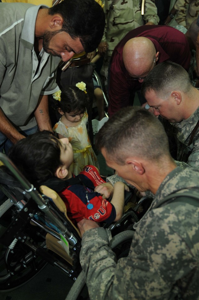 Soldiers help deliver mobility to Iraqi children