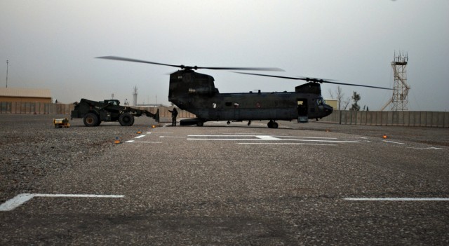 Departing Soldiers leave choppers behind