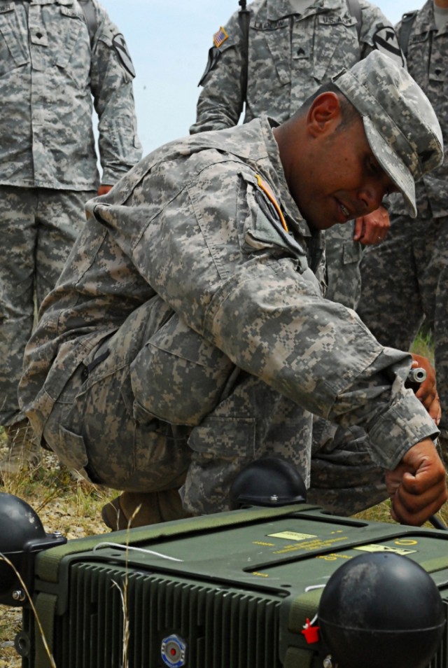 FORT HOOD, Texas-Sgt. Abel Leyva, from Fort Stockton, Texas, a communications specialist with 2nd Special Troops Battalion, 2nd Brigade Combat Team, 1st Cavalry Division, instructs Soldiers how to properly set up a High-Capacity Line-of-Sight...