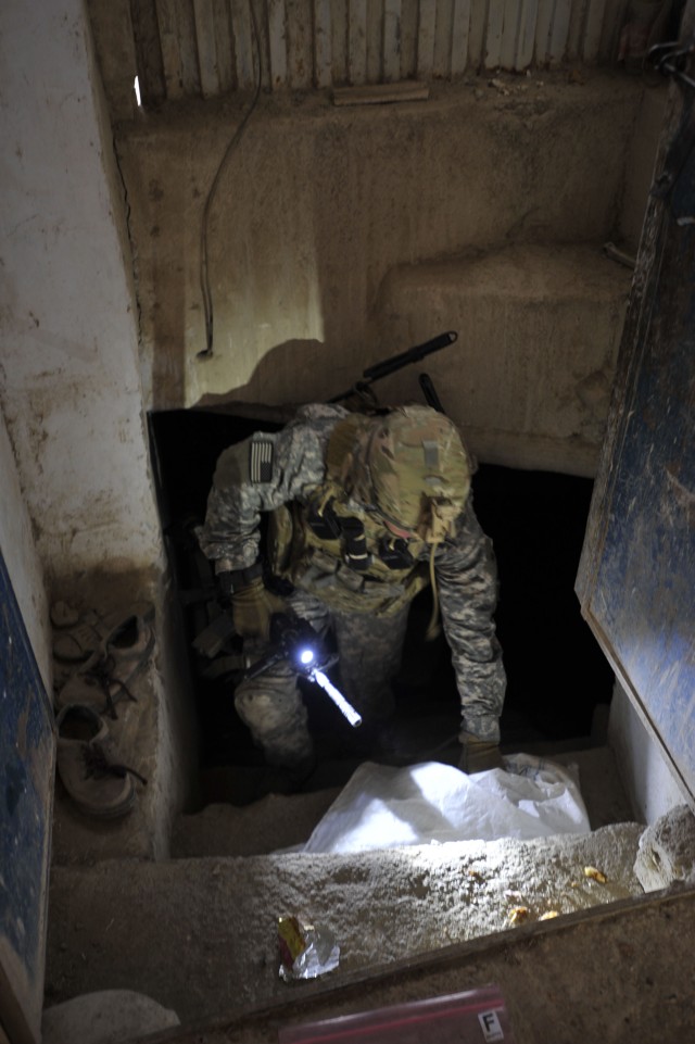 Task Force Red Knight captures 3, locates weapons cache