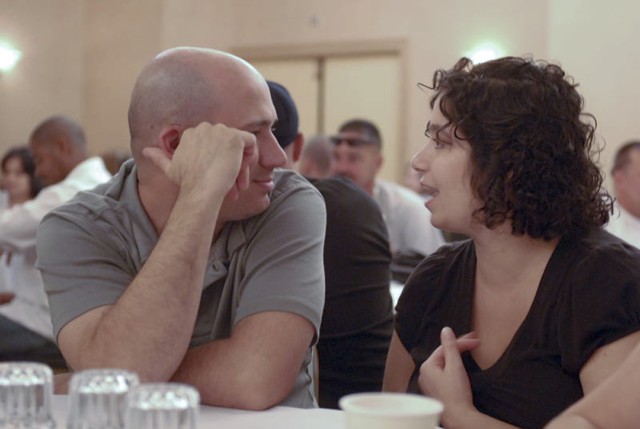FORT HOOD, Texas- Spc. Dennis Manwell (left), an unmanned aerial system operator assigned to 4th Brigade Special Troops Battalion, 4th Brigade Combat Team, 1st Cavalry Division, listens to his wife, Melody, as she tells him about the distractions...