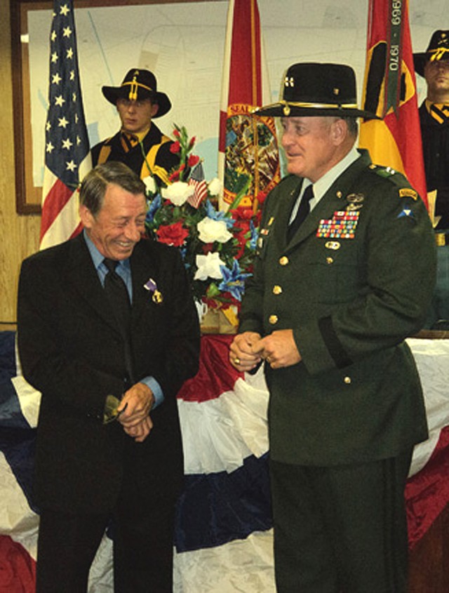 PORT ST. JOE. Fla. - Irey Weeks (left), a former specialist with E Company, 5th Battalion, 7th Cavalry Regiment, 1st Cavalry Division (1970), laughs with Maj. Gen. (Ret.) James Simmons, a former deputy commanding general, 1st Cavalry Division...