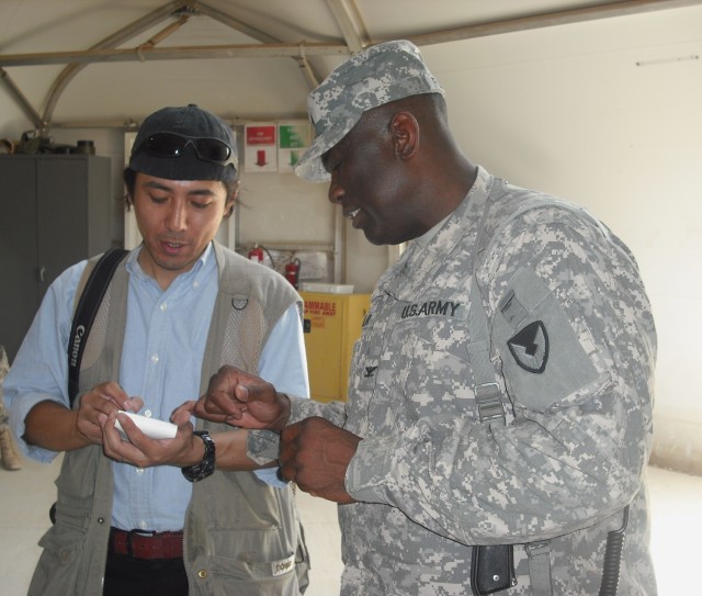 Col. Fuller meets the media