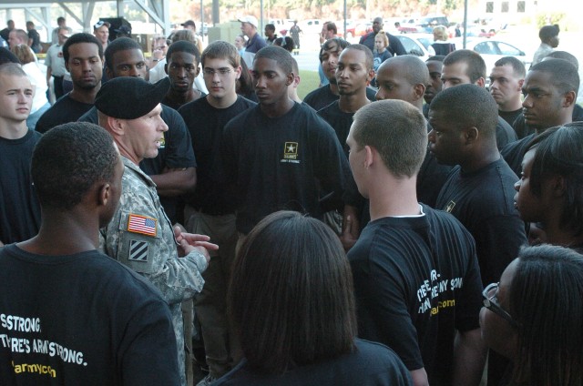 3rd ID command swears in recruits at football game