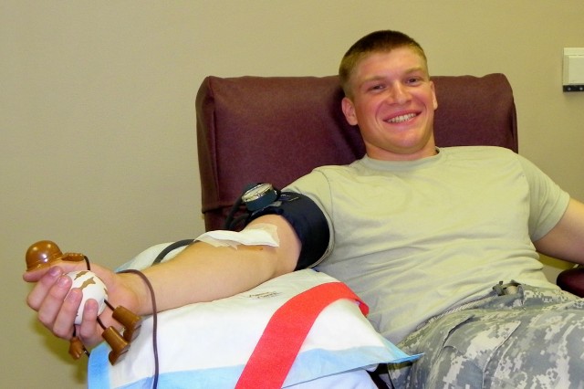 Soldiers March and Give Blood